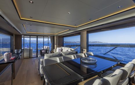 Absolute Navetta 75 motor yacht salon dining table