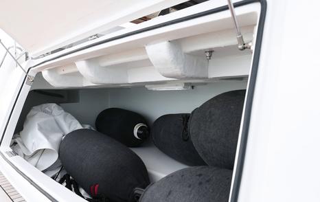 Sirena 48 aft storage compartment with fenders and cruising gear