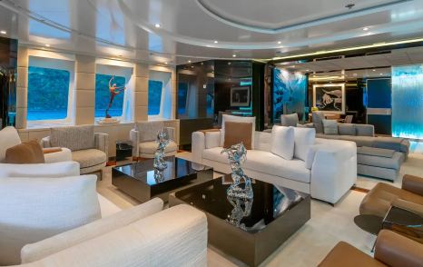 Abeking & Rasmussen Superyacht Scott Free skylounge with white furniture and black marble coffee table