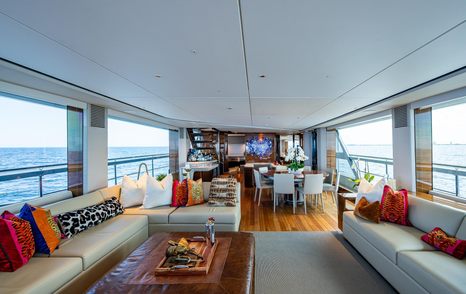 Motor Yacht Splash main saloon with aft circular dining table
