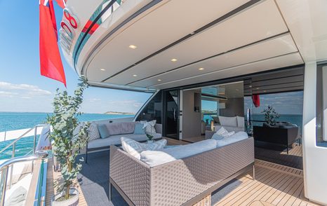 Motor yacht Hard 8's aft deck with shaded seating