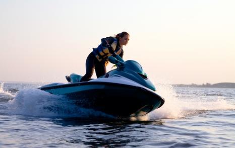 Woman on a jet ski at speed 