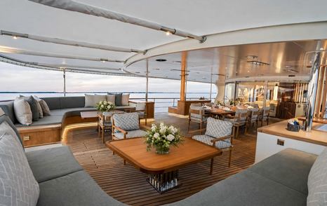 Amels expedition yacht aft deck lounge and dining area 