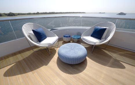 Aft deck seating area aboard the Gulf Craft Majesty 145 with panoramic sea views