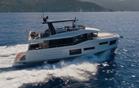 Beneteau Grand Trawler 63 bow view showing high freeboard and long-range cruising design