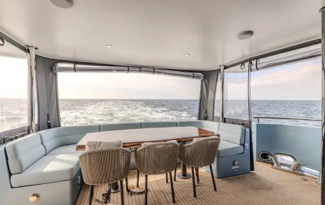 Steeler Ocean Explorer 72 yacht aft deck dining area 
