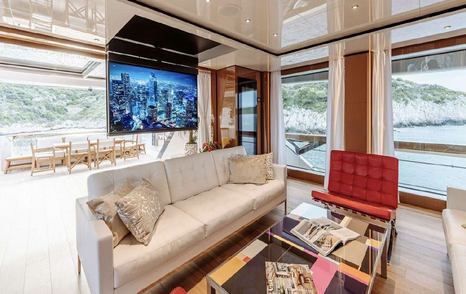 Superyacht Erolia main saloon seating with fold down TV