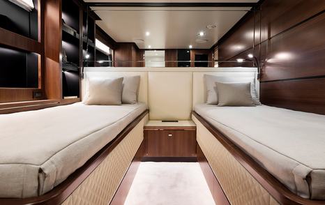 Horizon FD90 Skylounge motor yacht guest cabin with twin beds 