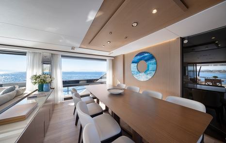 Motor yacht Spica's saloon dining table 