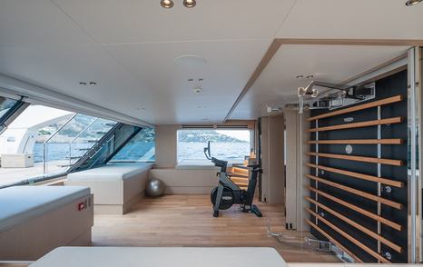 Superyacht Ami's lower stern gym 