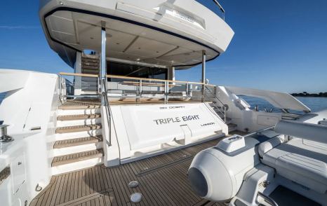 Motor Yacht Triple Eight aft deck with steps to flybridge