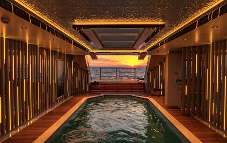 Night view of inside pool on superyacht TATIANA