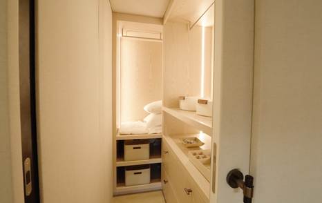 Sunreef Ultima 88 owner’s cabin walk-in wardrobe and dressing area