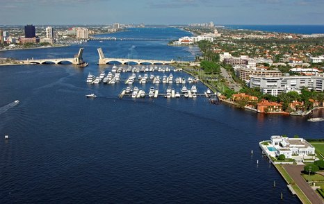 Aerial view of Town Marina – Palm Beach, motor yachts at moorings, surrounded by sea