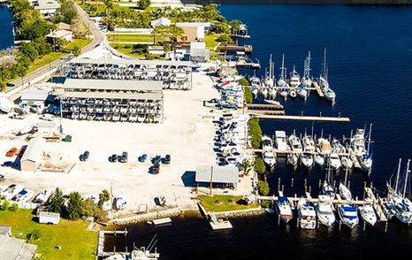 Overview of Shell Point Marina – Tampa Bay, motor yachts and sailing boats moored, surrounded by sea