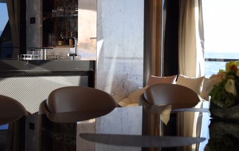 Close up of Superyacht Big Naan main saloon dining area chairs