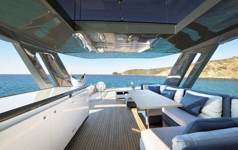 Motor Yacht Cloud Nine upper deck with sheltered seating area