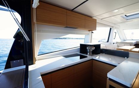 Solaris-Power-60-Coupe-Review-galley-layout-with-side-window-and-forward-saloon-connection