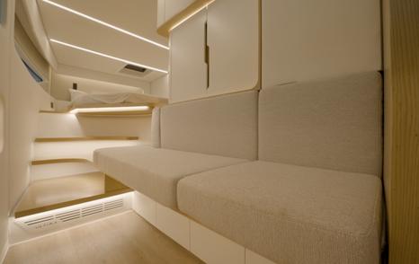 Sunreef-Ultima-55-Review-owner-cabin-sofa