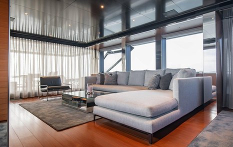 Motor Yacht T57's main saloon L-shaped sofa