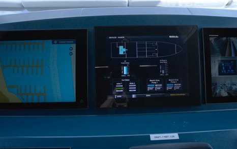 Benetti Oasis 34M navigation and vessel management displays showing chartplotter and onboard systems data.