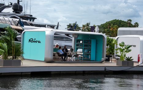 Riva concession at FLIBS with visitors relaxing in the lounge area