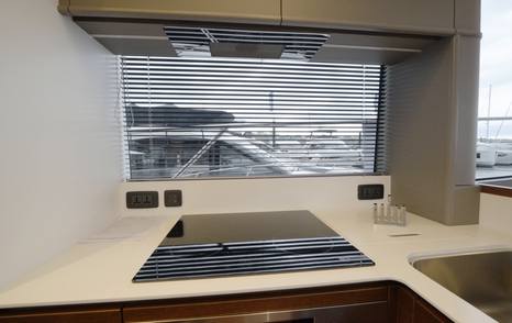 Princess S65 Mk2 galley with electric hob, sink and side window