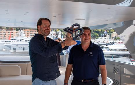 Jack Haines presenting YachtBuyer Hall of Fame for the CdM Flexplorer 146 at Monaco