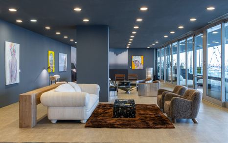 VIP lounge area with sofas and armchairs at the Genoa International Boat Show