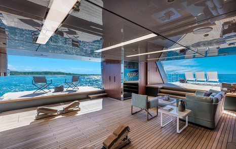 Riva 50Metri Superyacht beach club with sun loungers and sunpards