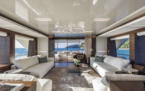 Motor Yacht Sokny main saloon with sofa and sliding glass doors 