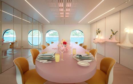 Superyacht Kasper interior dining table with circular windows