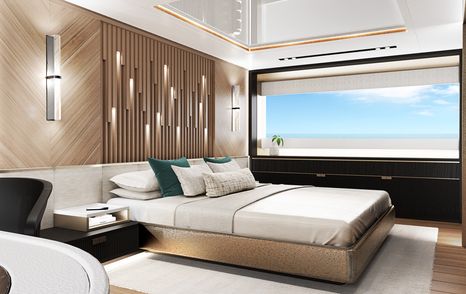 Master cabin onboard the Sunseeker Ocean 156. Central berth facing starboard with large window in background.