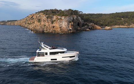 Nimbus-495-Flybridge-Review-at-sea-running-cliffs