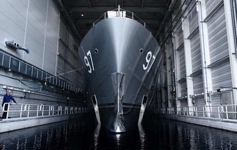 Water-level view of the bow on superyacht VALOR in construction shed