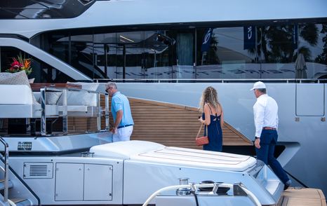 FLIBS visitors exploring a motor yacht