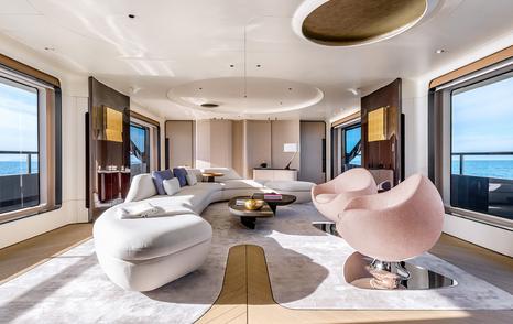 Azimut Grande Trideck superyacht main saloon with curved seating 