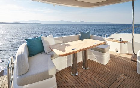 Princess F65 motor yacht aft deck seating area