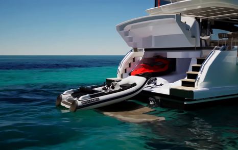 Pearl 73 tender garage open with Williams 345 launching astern