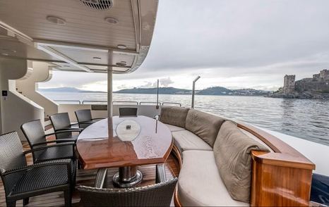 Superyacht Serenity II aft deck dining area 