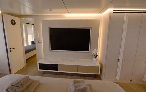 Numarine 40MXP main deck VIP cabin with television, wardrobe and en suite access
