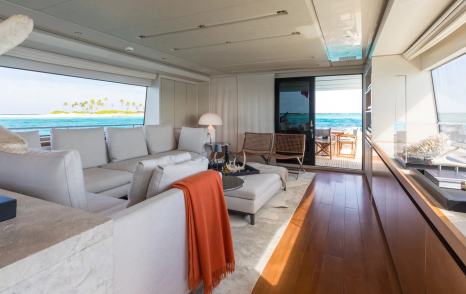 Motor Yacht Ferrol's interior seating area leading to aft deck