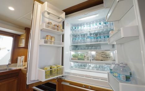 Fleming 85 full-height refrigerator and freezer storage in the main deck galley