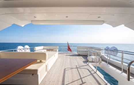 Motor Yacht Trinidad sundeck shaded seating and L-shaped sofas