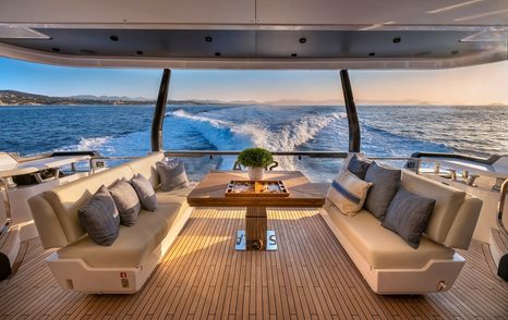 Motor Yacht Spica aft deck with dining table 