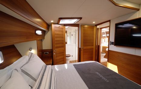 Grand-Banks-GB62-Flybridge-Review-owner-cabin-tv