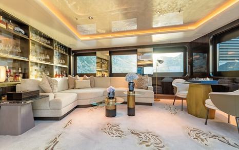 Damen Xplorer 60 expedition yacht saloon with L-shaped white sofa 