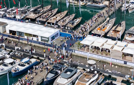 Aerial view looking down at a busy pontoon at the Genoa International Boat Show