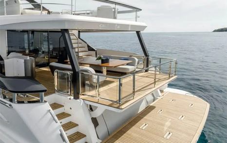 Motor Yacht Spribe's aft with shaded dining table