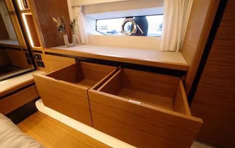 Solaris-Power-60-Coupe-Review-owners-cabin-drawer-storage-and-side-window-detail